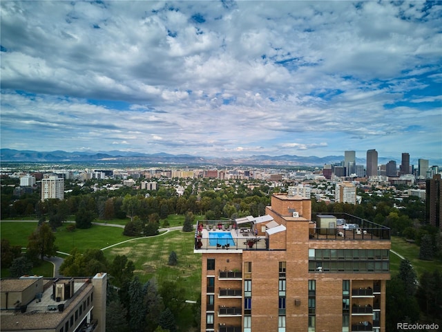 birds eye view of property featuring a mountain view