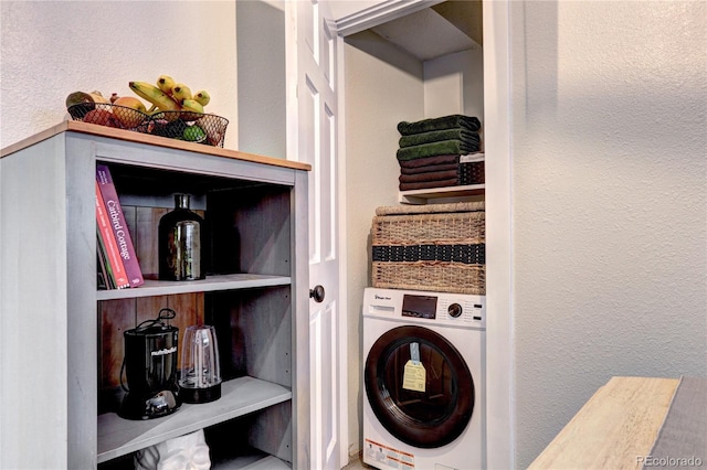 laundry area with washer / dryer