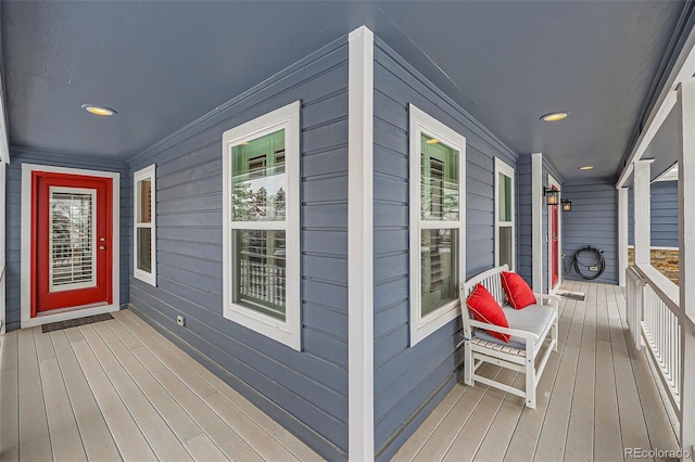 wooden deck featuring covered porch