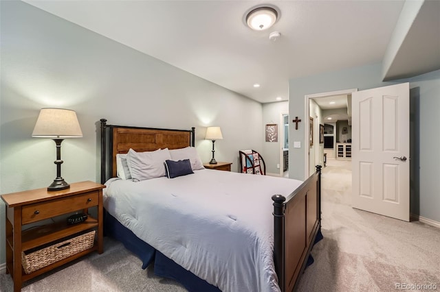 carpeted bedroom with recessed lighting and baseboards