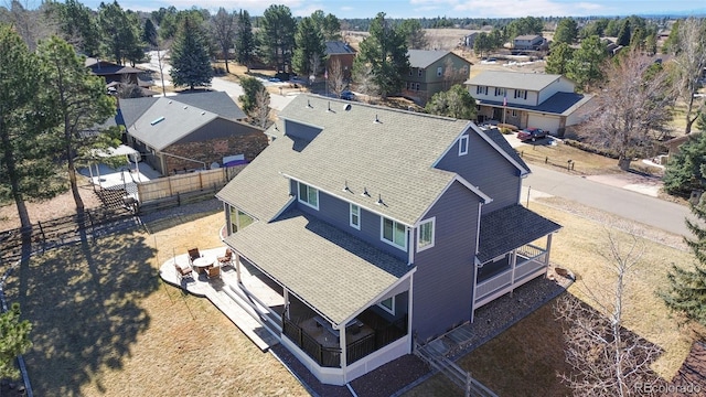 drone / aerial view with a residential view