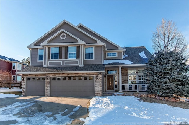 view of front of house with a porch and a garage