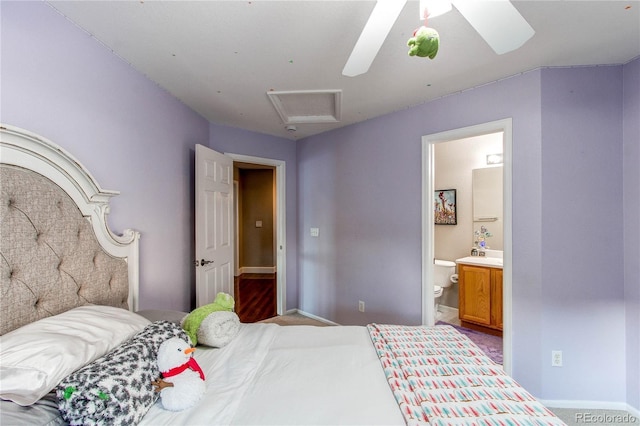 bedroom with ceiling fan and connected bathroom