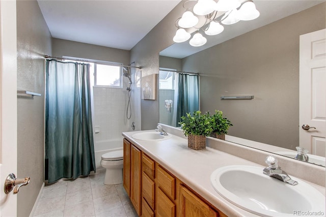 full bathroom with shower / tub combo, toilet, tile patterned floors, vanity, and a notable chandelier