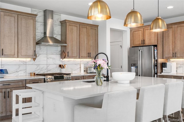 9140 Moondance Dr, Littleton, CO 80125 - kitchen with appliances with stainless steel finishes, wall chimney range hood, decorative backsplash, and recessed lighting