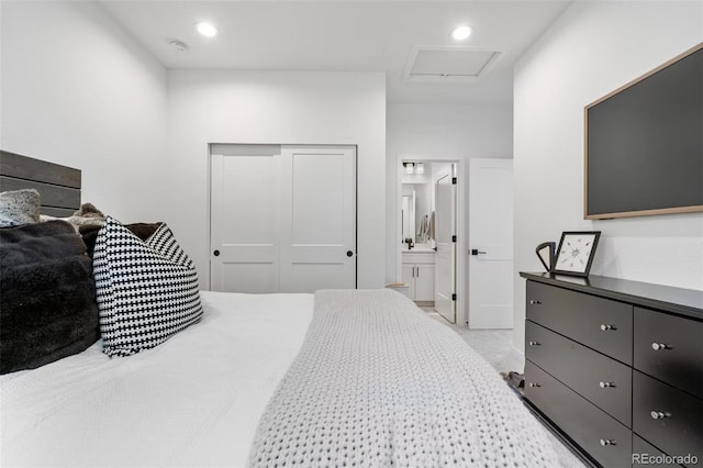 9140 Moondance Dr, Littleton, CO 80125 - bedroom with attic access, a closet, ensuite bath, and recessed lighting