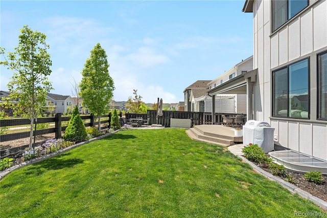 9140 Moondance Dr, Littleton, CO 80125 - view of yard featuring a residential view and a deck