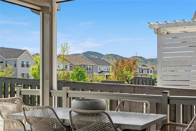 9140 Moondance Dr, Littleton, CO 80125 - wooden deck featuring a residential view and a mountain view