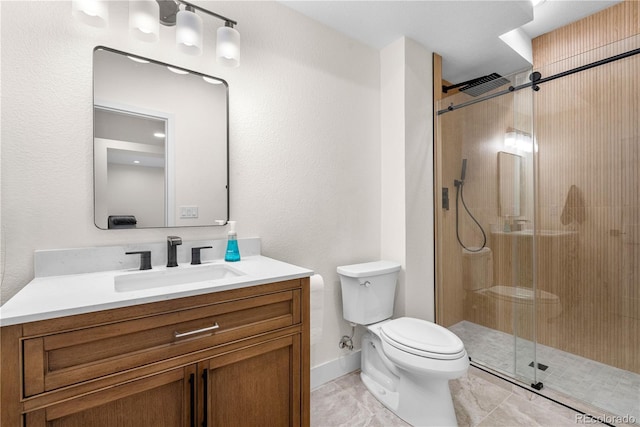 9140 Moondance Dr, Littleton, CO 80125 - bathroom with toilet, vanity, a stall shower, and tile patterned flooring