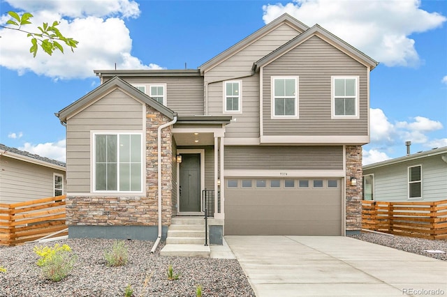 view of front of home with a garage