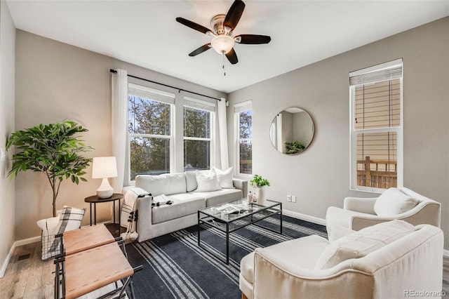 2820 Macon Way, Denver, CO 80238 - living area featuring baseboards, a ceiling fan, and wood finished floors
