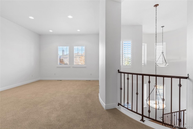 7882 Vallagio Ln, Englewood, CO 80112 - hallway featuring carpet flooring, an upstairs landing, and recessed lighting