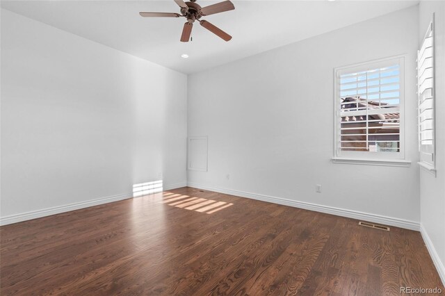7882 Vallagio Ln, Englewood, CO 80112 - empty room with a ceiling fan, wood finished floors, and recessed lighting