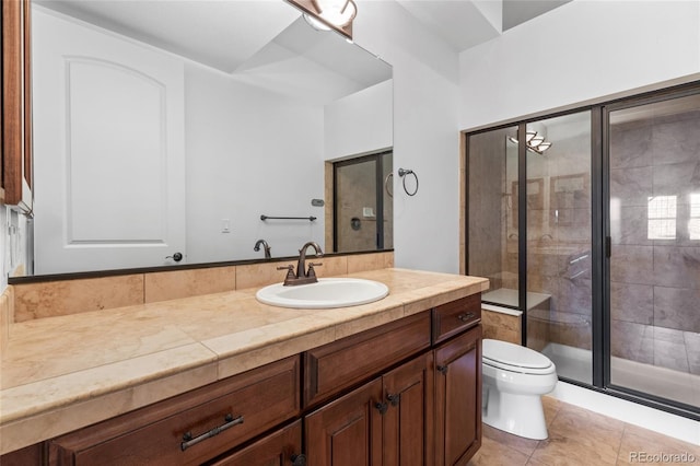 7882 Vallagio Ln, Englewood, CO 80112 - bathroom with vanity, a shower stall, and tile patterned flooring