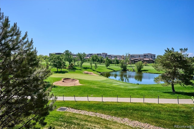7882 Vallagio Ln, Englewood, CO 80112 - view of community featuring view of golf course, a water view, and a yard