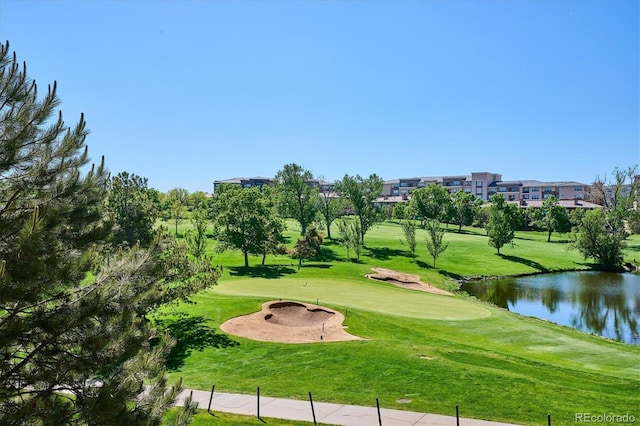 7882 Vallagio Ln, Englewood, CO 80112 - surrounding community featuring view of golf course, a water view, and a yard
