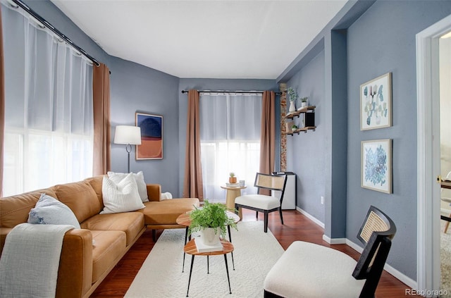 sitting room with dark hardwood / wood-style floors