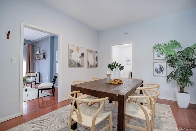 dining room featuring hardwood / wood-style flooring