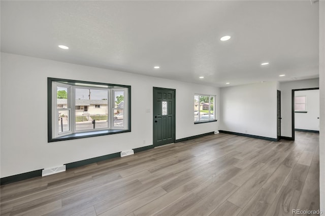 7810 Larkwood St, Commerce City, CO 80022 - entrance foyer with recessed lighting and light wood finished floors