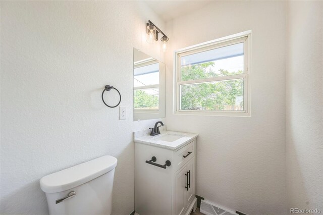 7810 Larkwood St, Commerce City, CO 80022 - bathroom featuring toilet and vanity