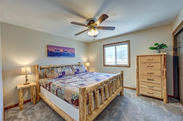 bedroom with carpet floors, a ceiling fan, and baseboards