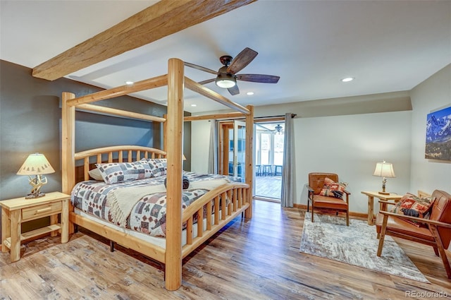 bedroom with access to exterior, beam ceiling, recessed lighting, wood finished floors, and baseboards