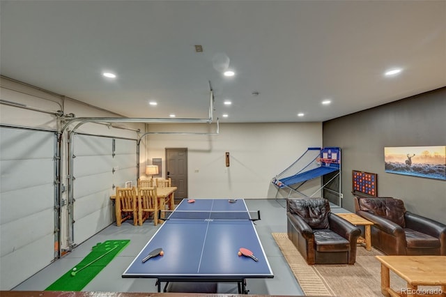 playroom featuring a garage and recessed lighting