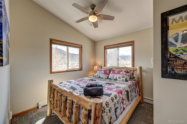 bedroom featuring a baseboard heating unit, carpet, multiple windows, and vaulted ceiling