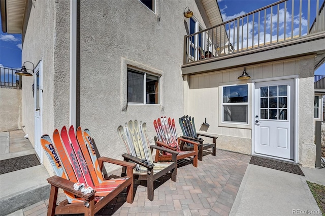 view of patio with a balcony