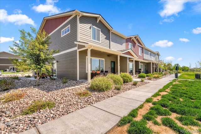 3674 Ronald Reagan Ave, Wellington, CO 80549 - view of property exterior featuring board and batten siding and central AC unit