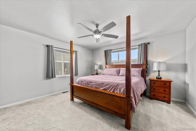3674 Ronald Reagan Ave, Wellington, CO 80549 - carpeted bedroom featuring baseboards, ceiling fan, and a textured ceiling