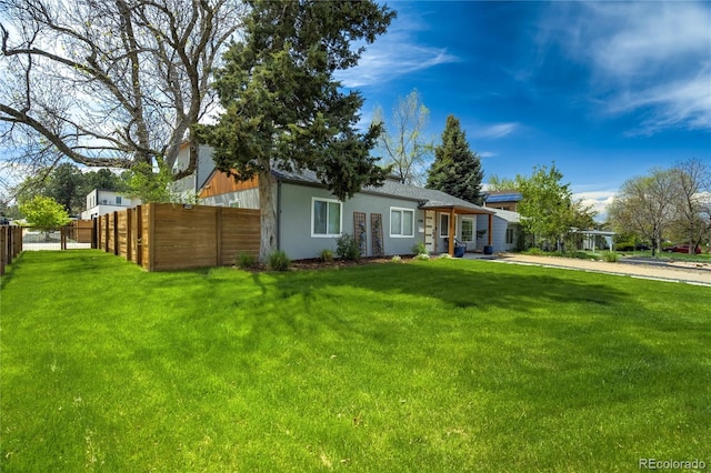 back of property featuring stucco siding