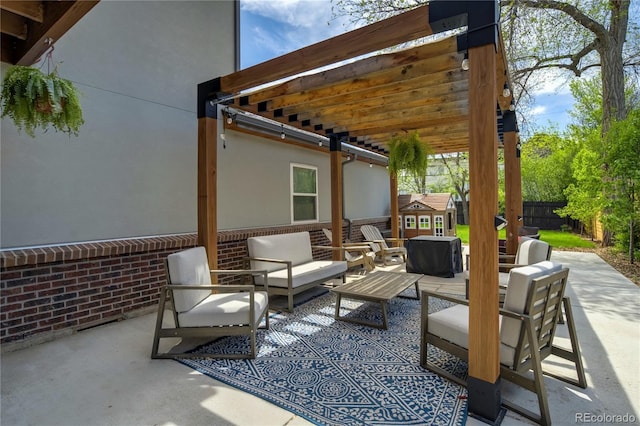 view of patio featuring an outdoor hangout area and fence
