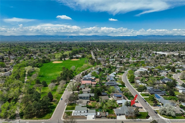 aerial view of residential area with a mountain backdrop
