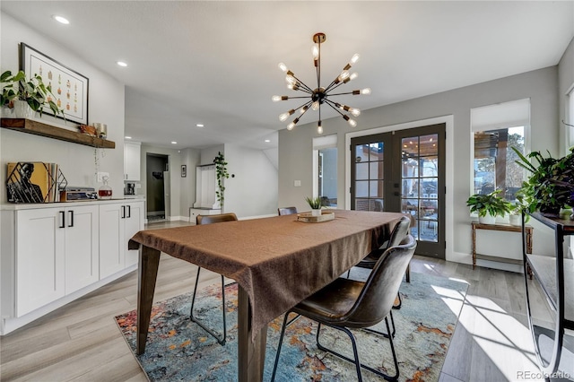 4790 E Dartmouth Ave, Denver, CO 80222 - dining room featuring french doors, a chandelier, recessed lighting, light wood finished floors, and baseboards