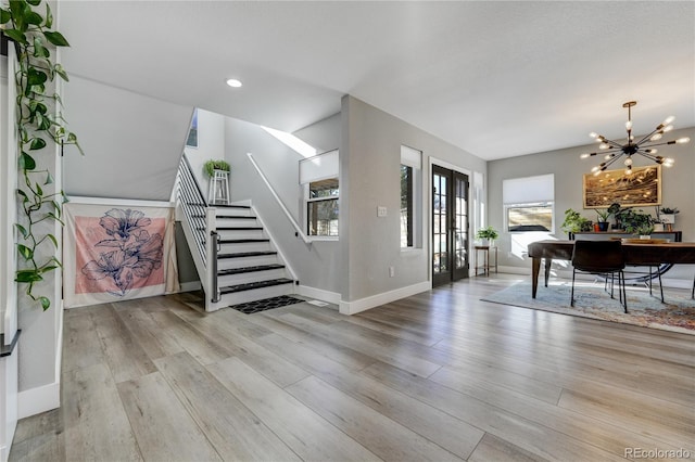 4790 E Dartmouth Ave, Denver, CO 80222 - foyer with a chandelier, baseboards, wood finished floors, stairs, and recessed lighting