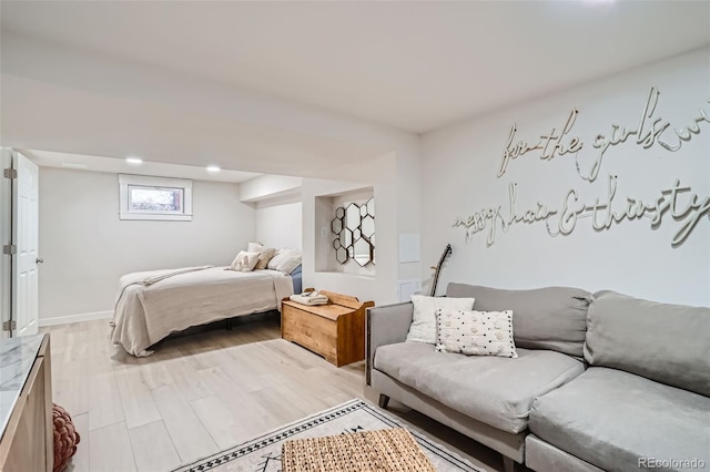 bedroom with light hardwood / wood-style floors