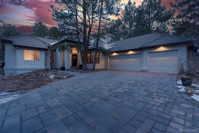 view of front of property with a garage