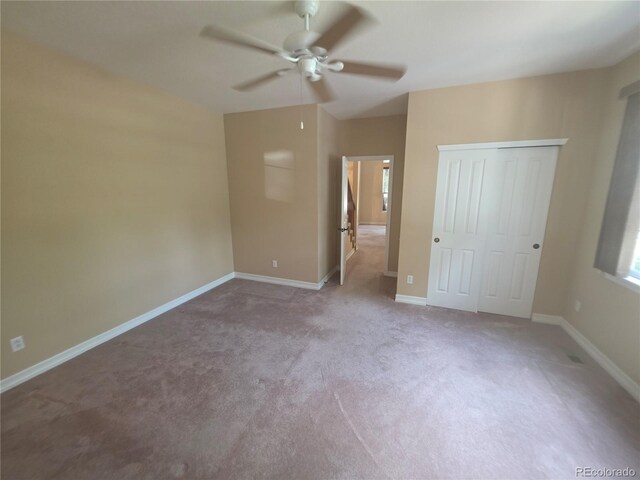 8911 Tappy Toorie Pl, Highlands Ranch, CO 80129 - unfurnished bedroom with carpet floors, a closet, and ceiling fan