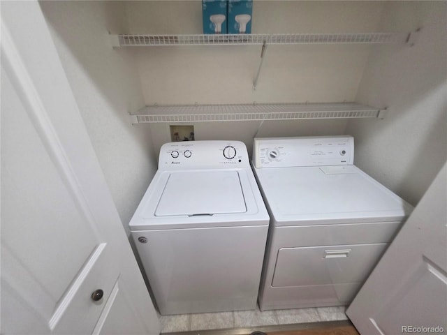 8911 Tappy Toorie Pl, Highlands Ranch, CO 80129 - laundry area with separate washer and dryer