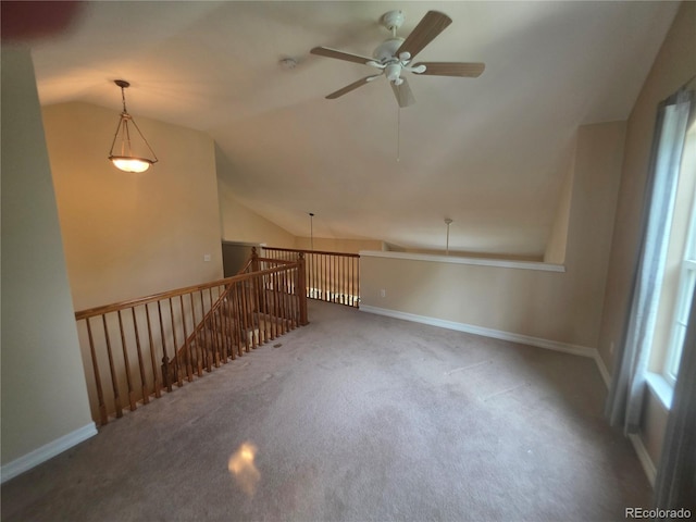 8911 Tappy Toorie Pl, Highlands Ranch, CO 80129 - carpeted empty room with lofted ceiling, ceiling fan, and a smoke detector