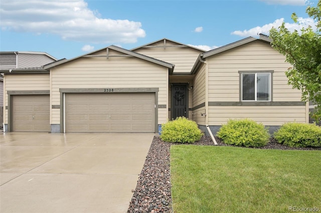 2328 Saddle Back Ct, Fort Lupton, CO 80621 - ranch-style house featuring an attached garage, concrete driveway, and a front lawn