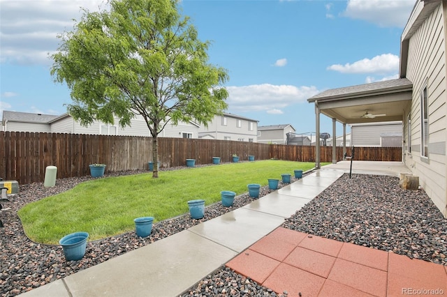 2328 Saddle Back Ct, Fort Lupton, CO 80621 - view of yard featuring a ceiling fan and a patio area