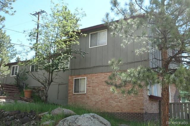 28127 Knowles Rd Unit A, B, & C, Evergreen, CO 80439 - view of side of property featuring brick siding and board and batten siding