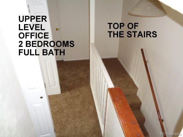 28127 Knowles Rd Unit A, B, & C, Evergreen, CO 80439 - hall with carpet flooring and an upstairs landing