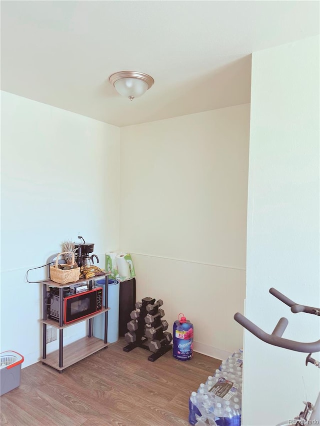 miscellaneous room with wood-type flooring