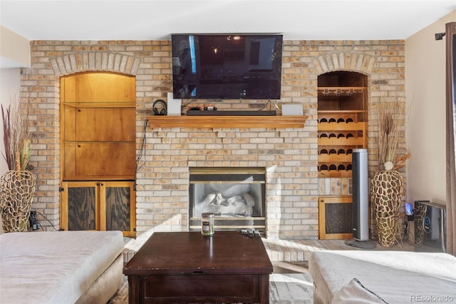 living room featuring built in shelves