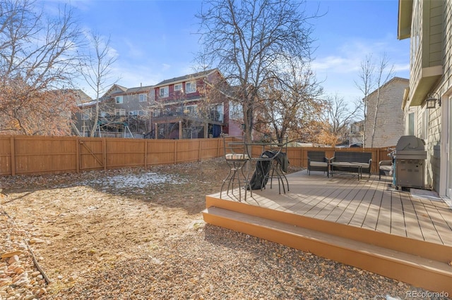 view of yard with a wooden deck