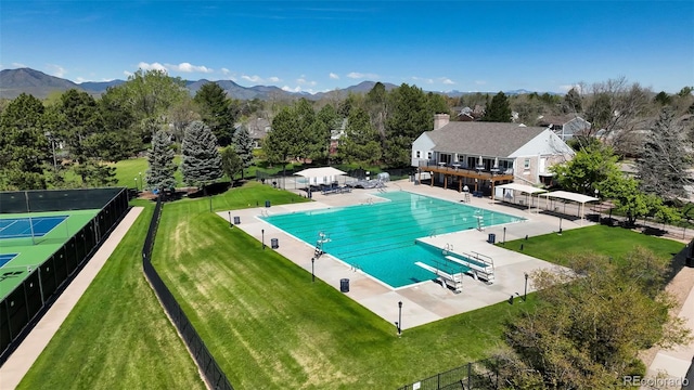 9867 W Berry Dr, Littleton, CO 80123 - community pool with a patio and a mountain view