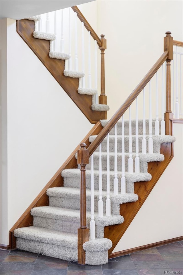 9867 W Berry Dr, Littleton, CO 80123 - stairs with baseboards